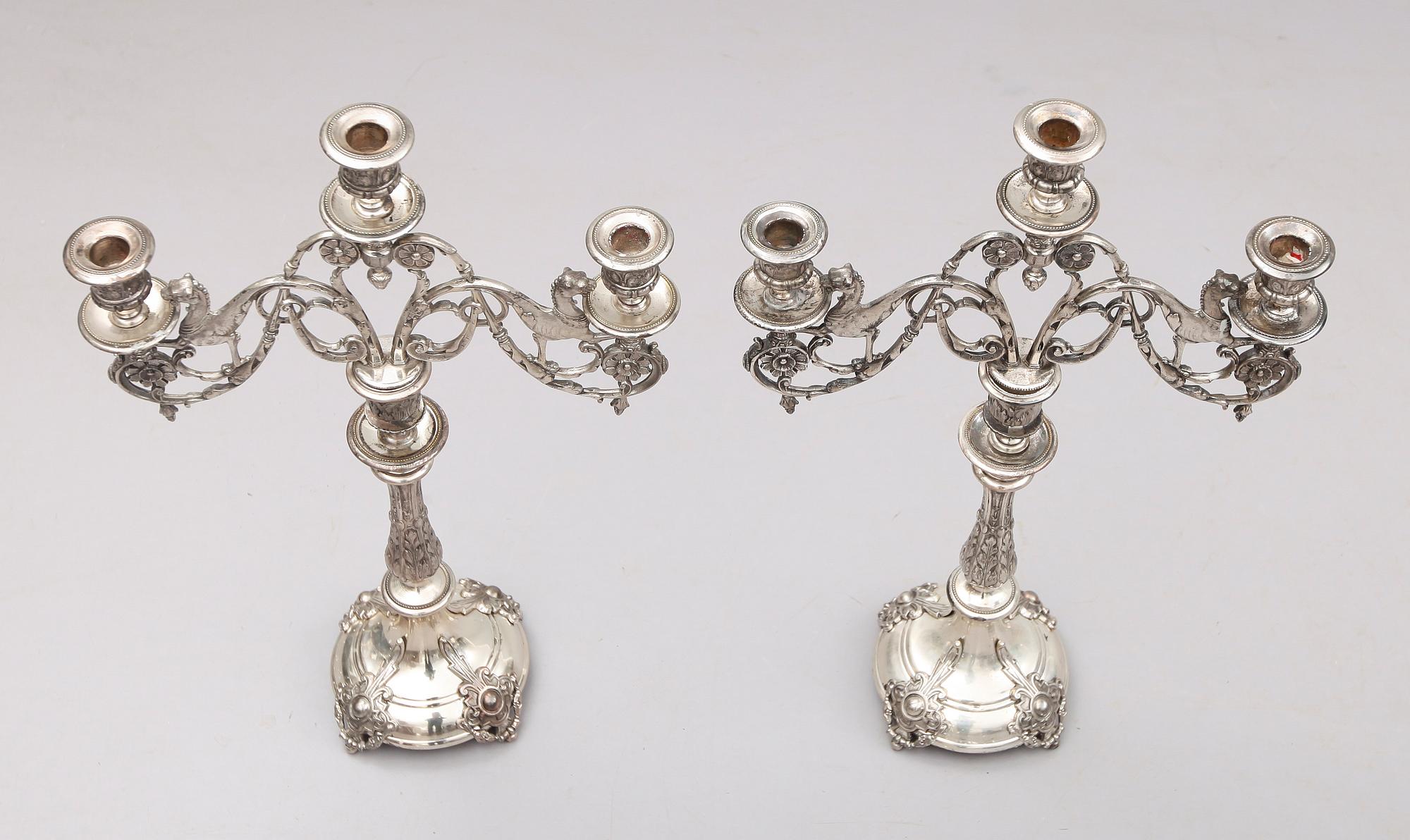 KANDELABRAR, 1 par, nysilver, omkring år 1900.