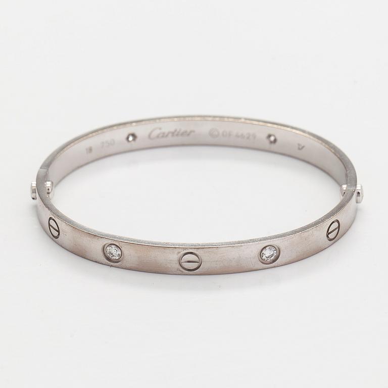 Cartier, rannekoru "Love", 18K valkokultaa, briljanttihiottuja timantteja.