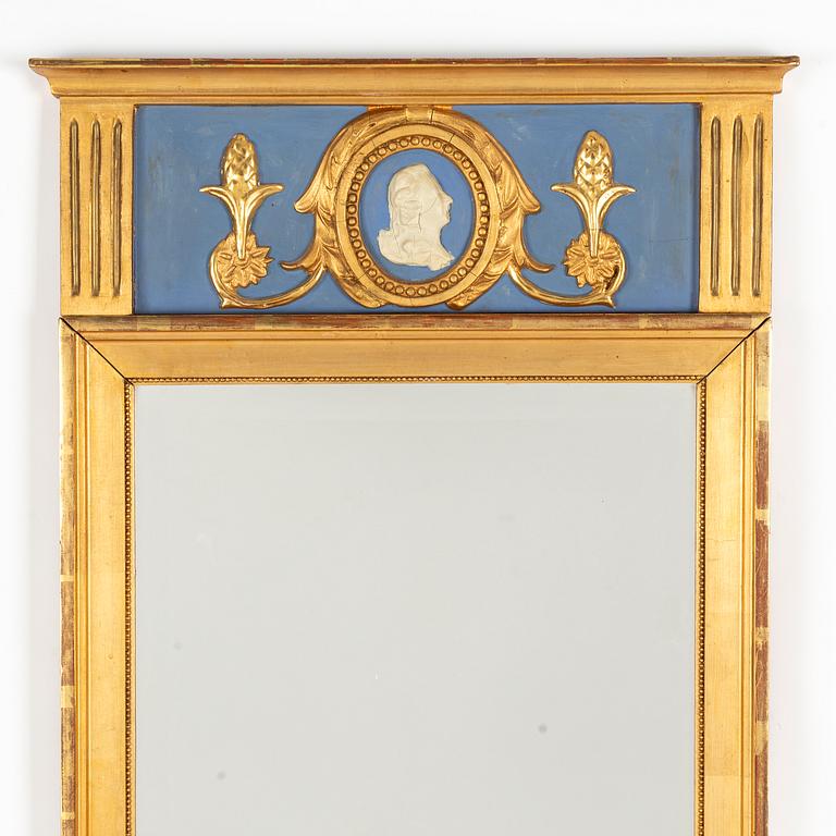 A Gustavian style mirror, mid 20th century.