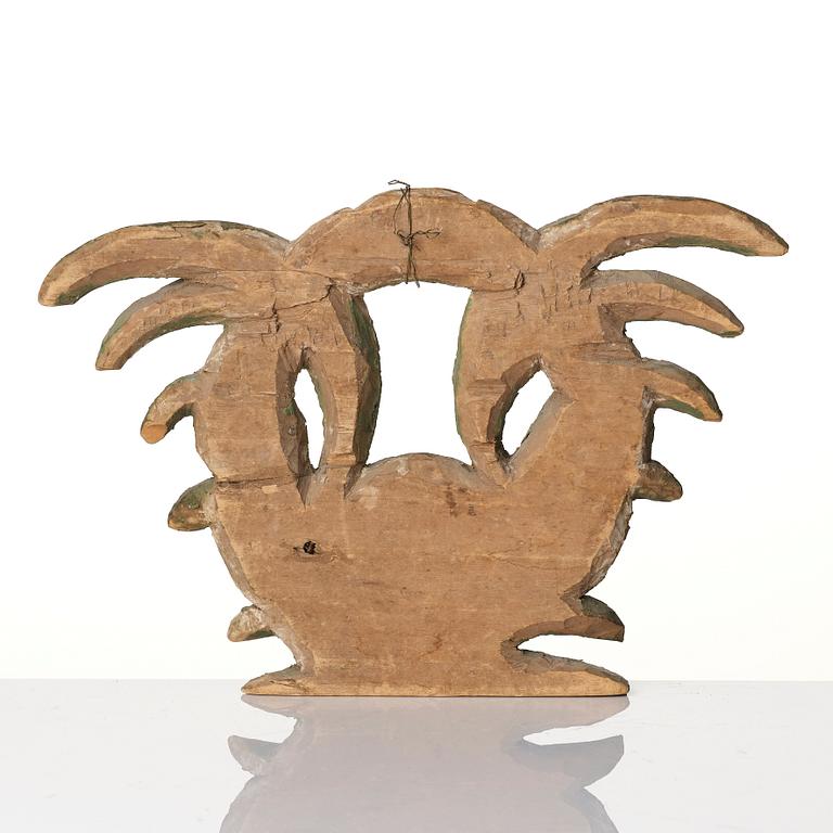 A Swedish baroque carved and painted wreath, later part 17th century.