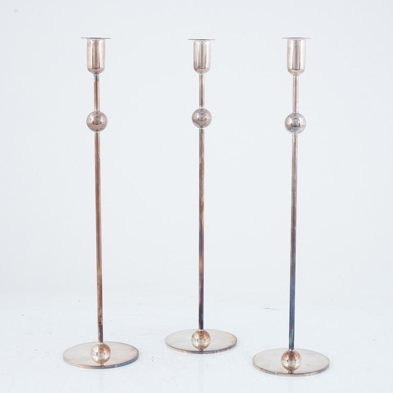 Estrid Ericson, a set of three 'Kulan' candlesticks, Firma Svenskt Tenn.