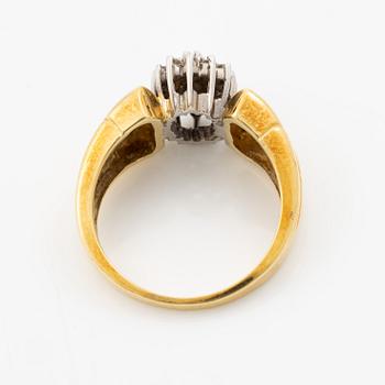 18K gold ring with diamonds.