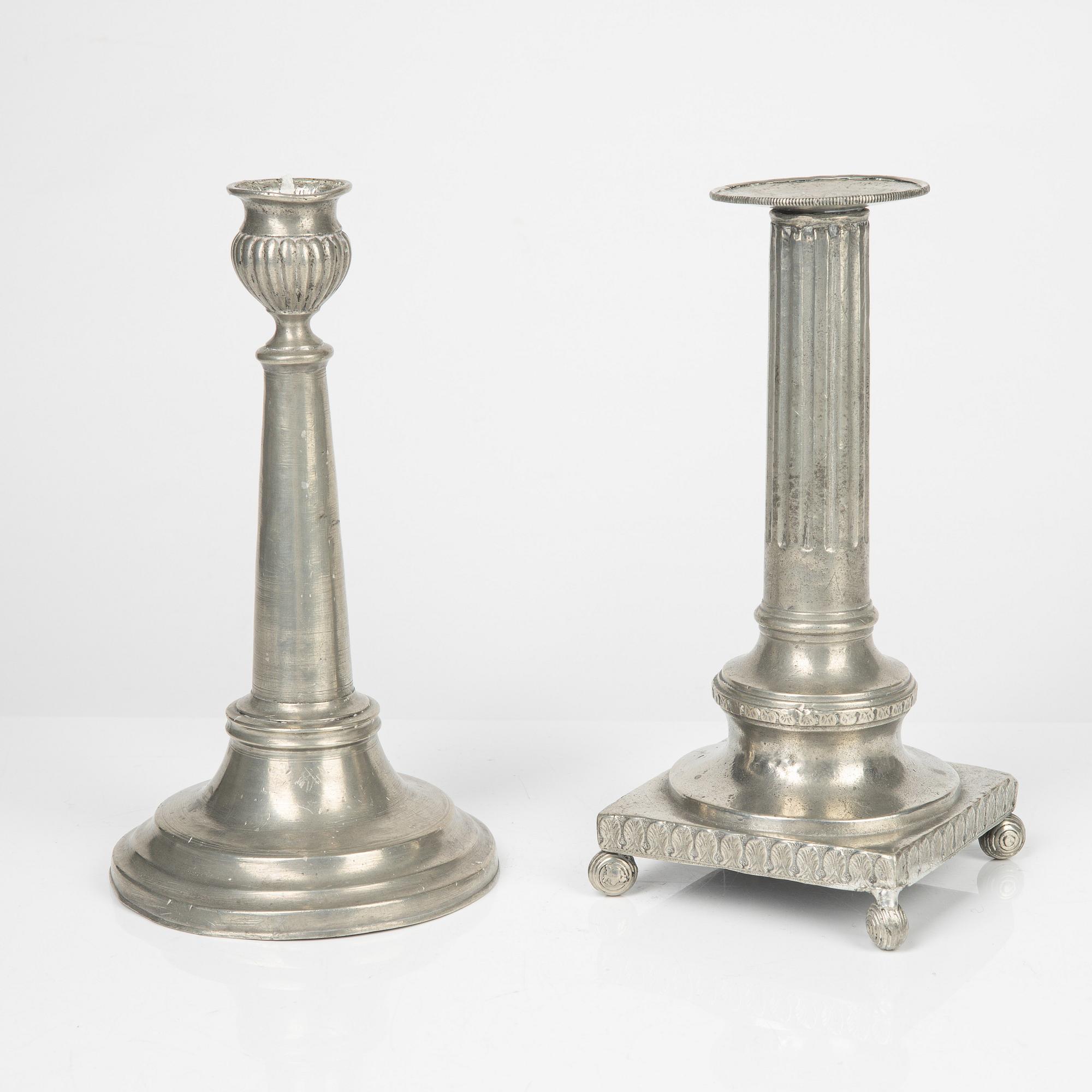 Two pewter candlesticks, 19th Century.