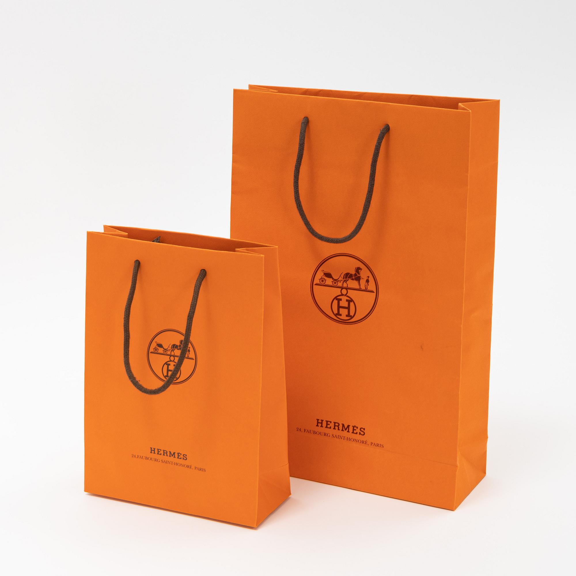 Hermès, two silk scarves.