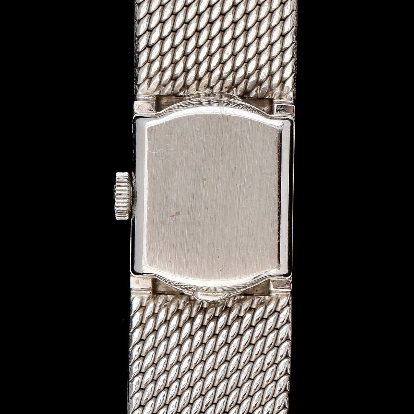 ARMBANDSUR, 18K vitguld med biljantslipade diamanter, Omega. Total vikt ca 55 g.