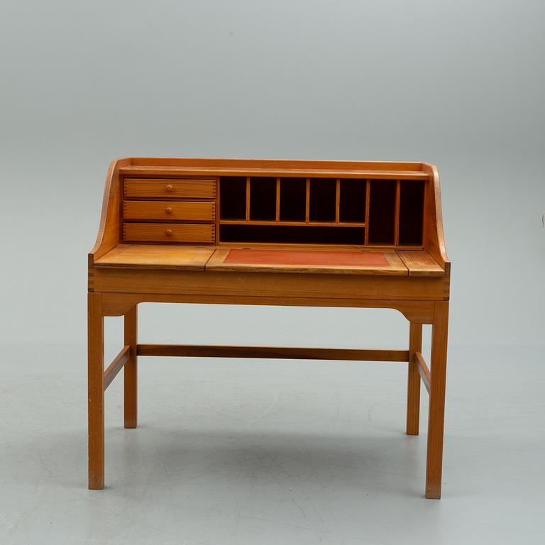 A mid 20th century writing desk by Andreas Hansen for Hadsten Träindustri, Denmark.