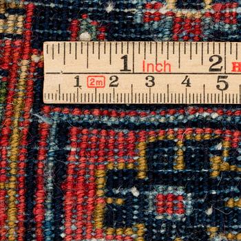 A semi-antique Sarouk, aroud 330 x 224 cm.