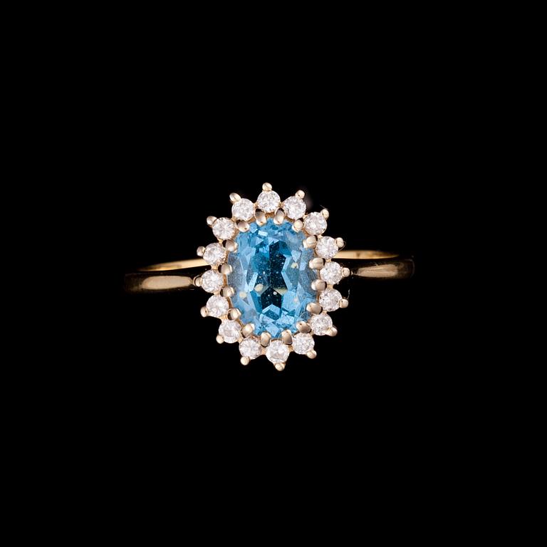 RING, 18K guld, topas, diamanter. Vikt ca 3,4 g.