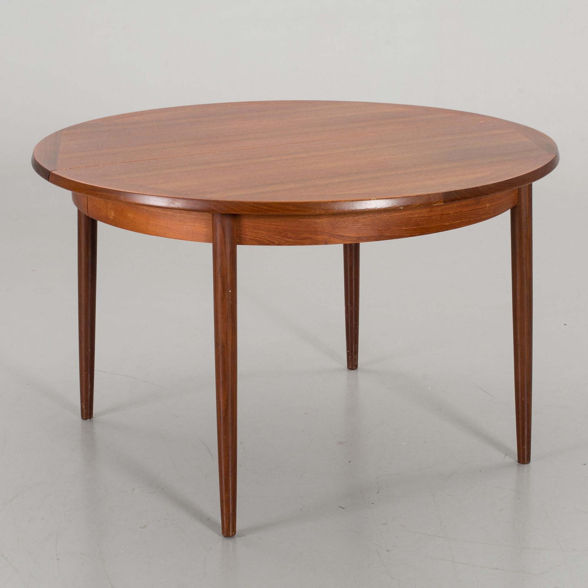 A NORWEGIAN DINNER TABLE, second half of 20th century.