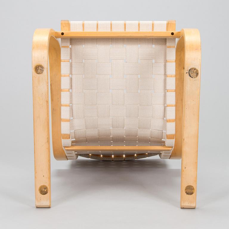 Alvar Aalto, a pair of late 20th century armchair model 406 Artek.