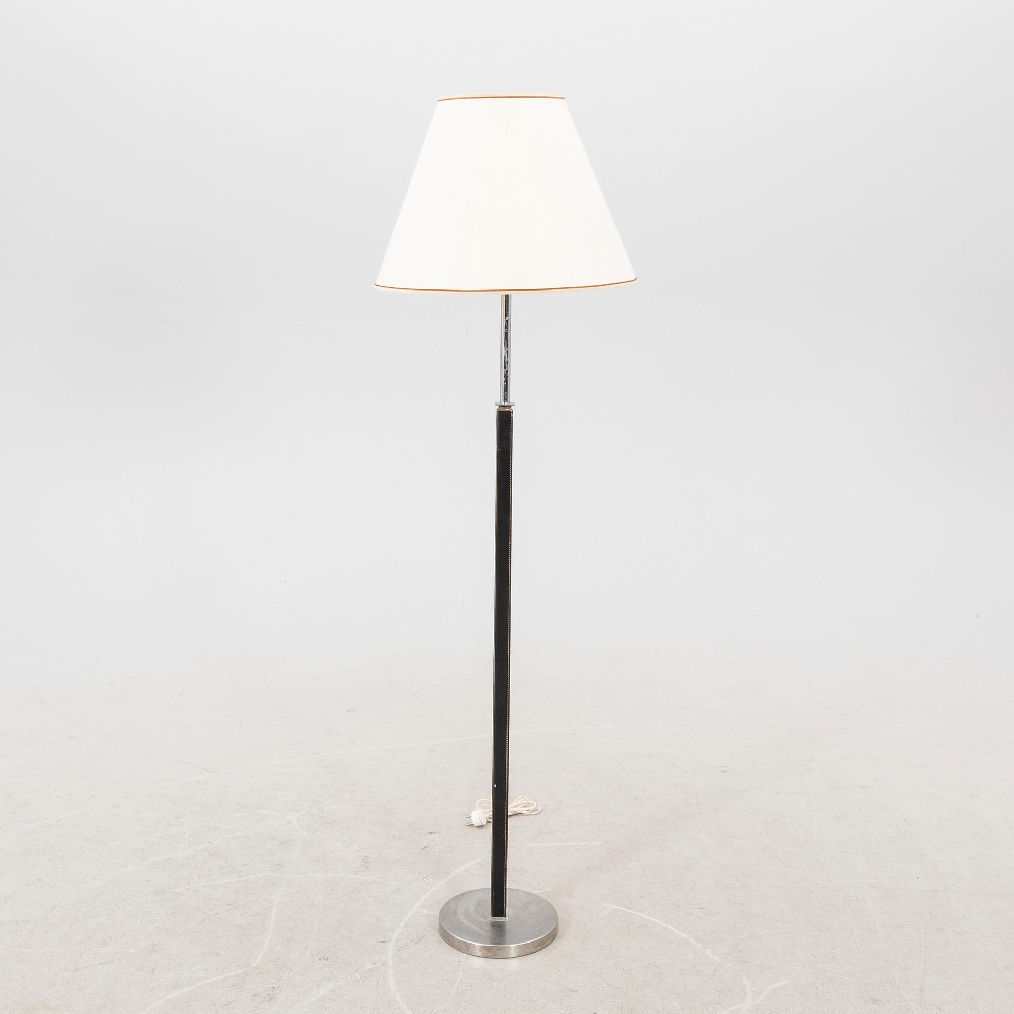 A Philips leather and chrome floor lamp model no 590A later part of the 20th century.