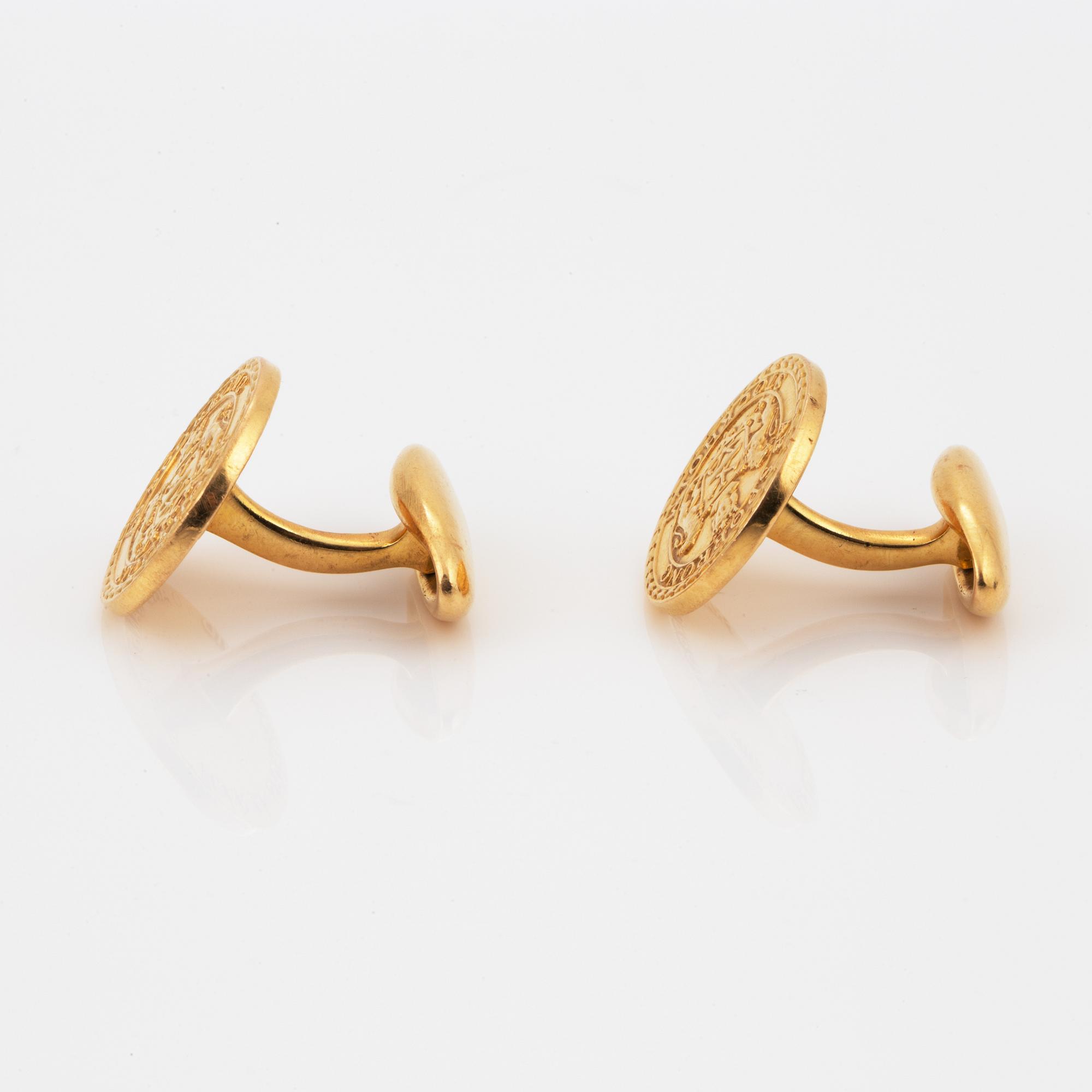 MANSCHETTKNAPPAR, Sporrong, 18K guld.