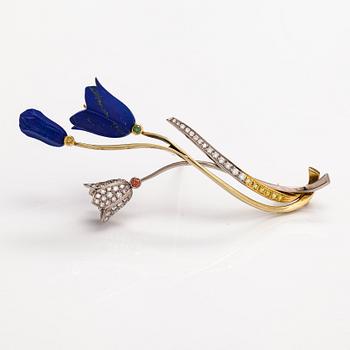 Raimo Nieminen, An 18K yellow, green and white gold brooch with diamonds ca. 1.40 ct and lapis lazuli. 2006.