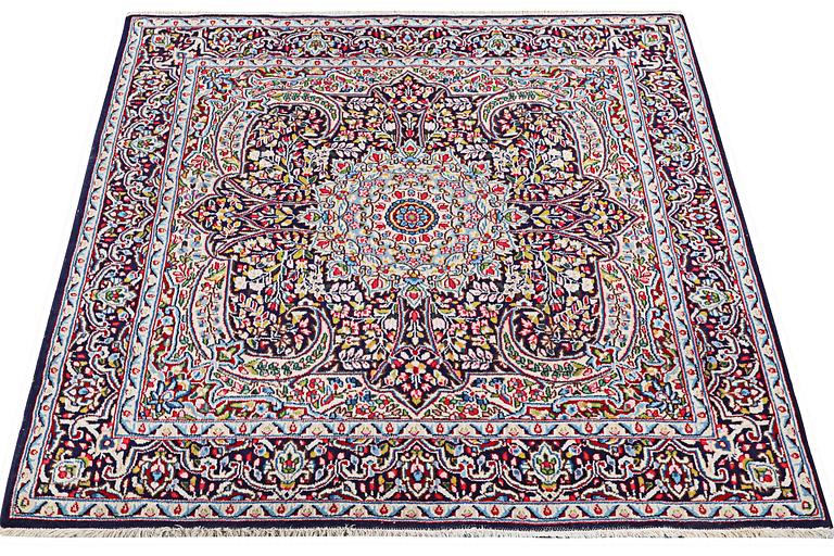 A Kerman rug, c. 149 x 147 cm.