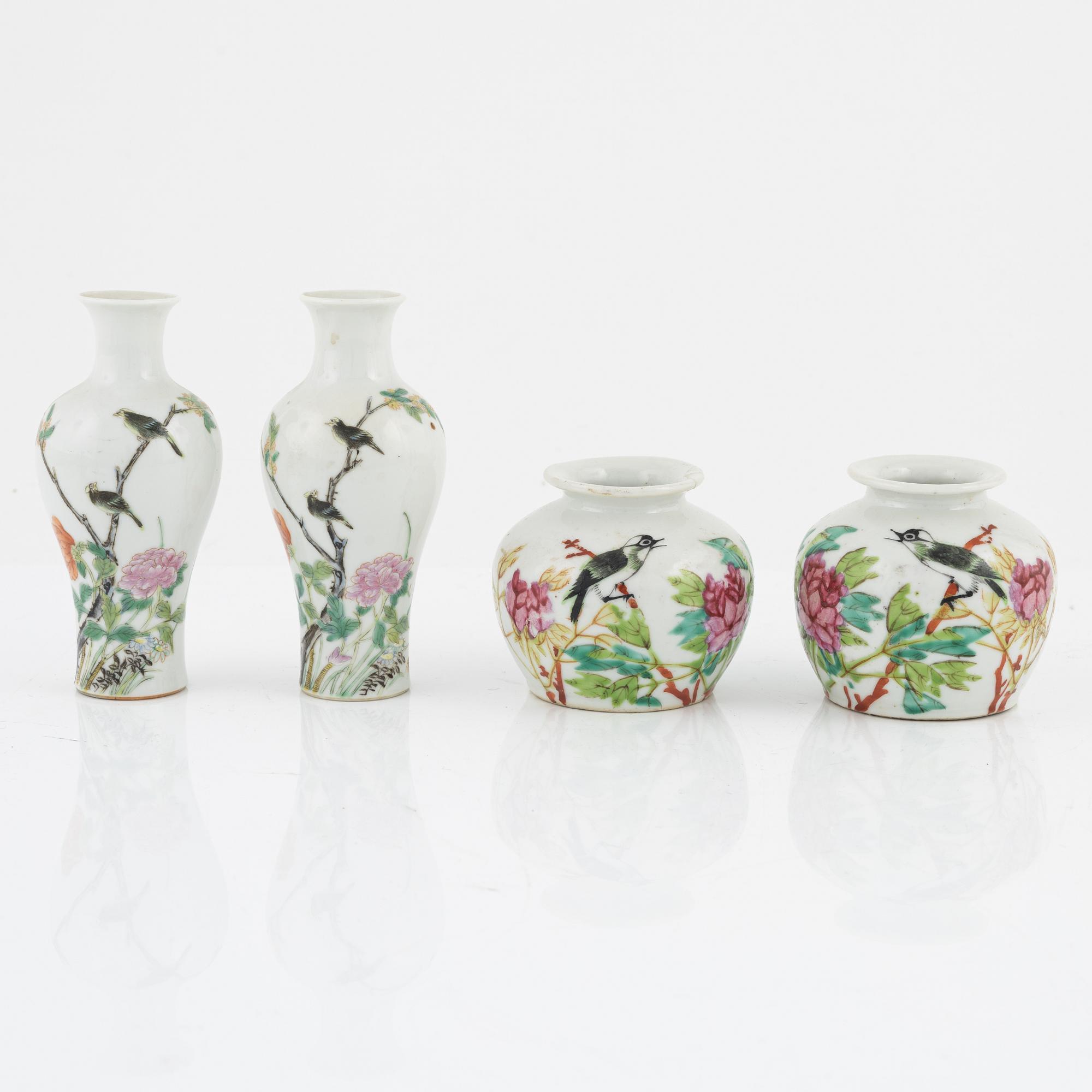 A set of eight Chinese vases, late Qing dynasty/20th Century.