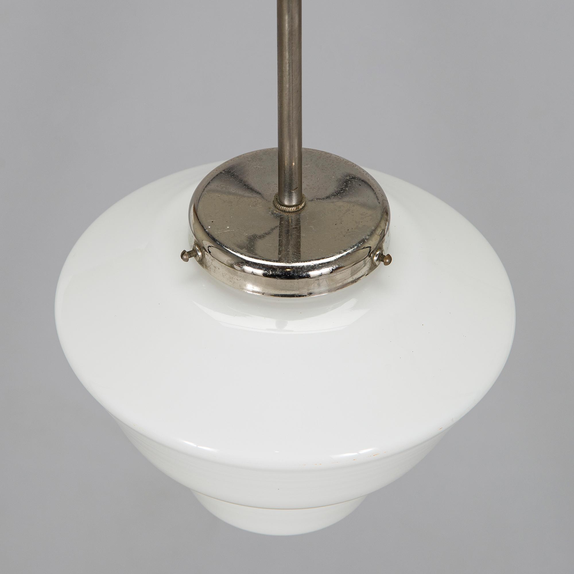 Paavo Tynell, kattovalaisin, malli 553 Taito 1930-luku.