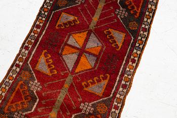 An antique, central Anatolian yastik fragment, c. 113 x 53 cm.