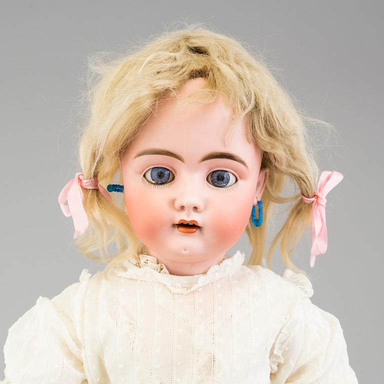 a porcelain doll from the 1920's.