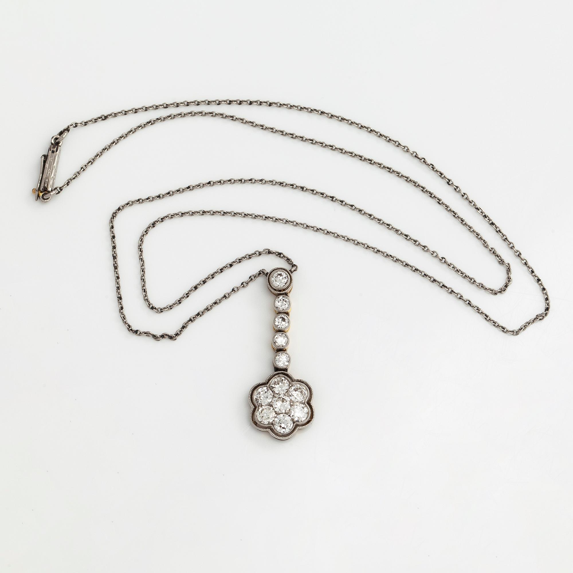 A platinum/17K gold necklace, set with old-cut diamonds, first half of the 20th century.