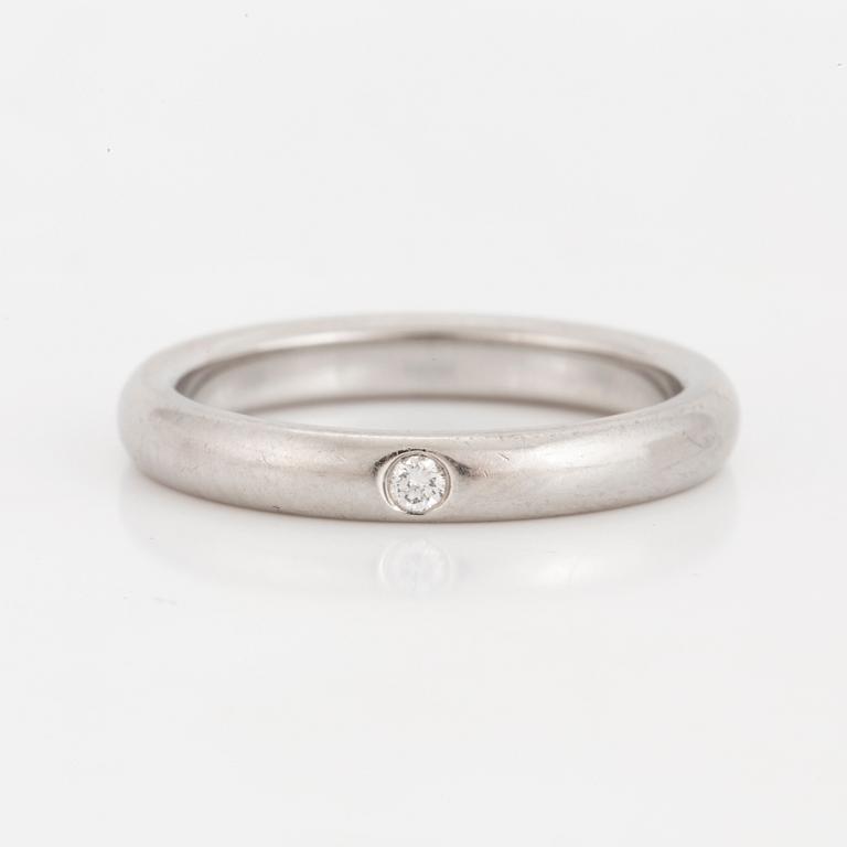 RING, Tiffany wedding band in platinum with one diamond 0.02 cts.