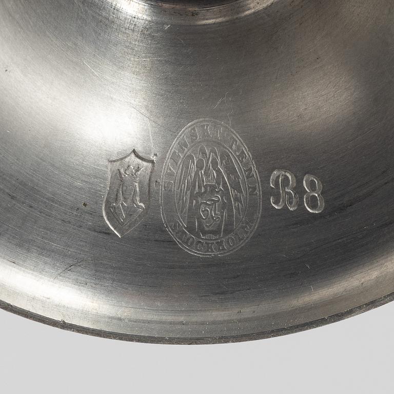 A pair of pewter candle sticks, model A702, Firma Svenskt Tenn, Sweden, 1928.