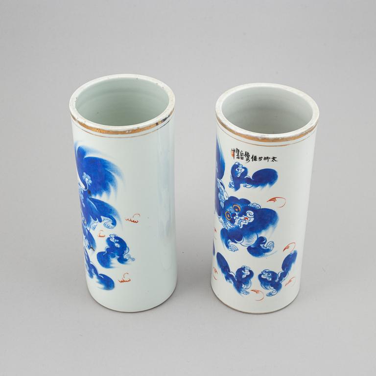 Two vases with buddhist lions in blue, China, 20th Century.