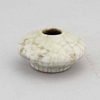 A Chinese celadon glazed lotus leaf shaped bowl, late Qing dynasty, and a ge-glazed brush washer, possibly 20 century.
