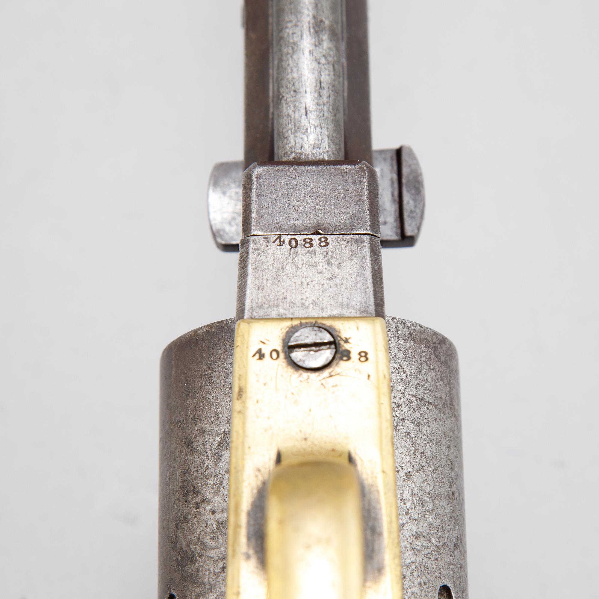 A Colt Dragoon first model percussion revolver with replacement barrel with British marks. serial no on other parts 4088.