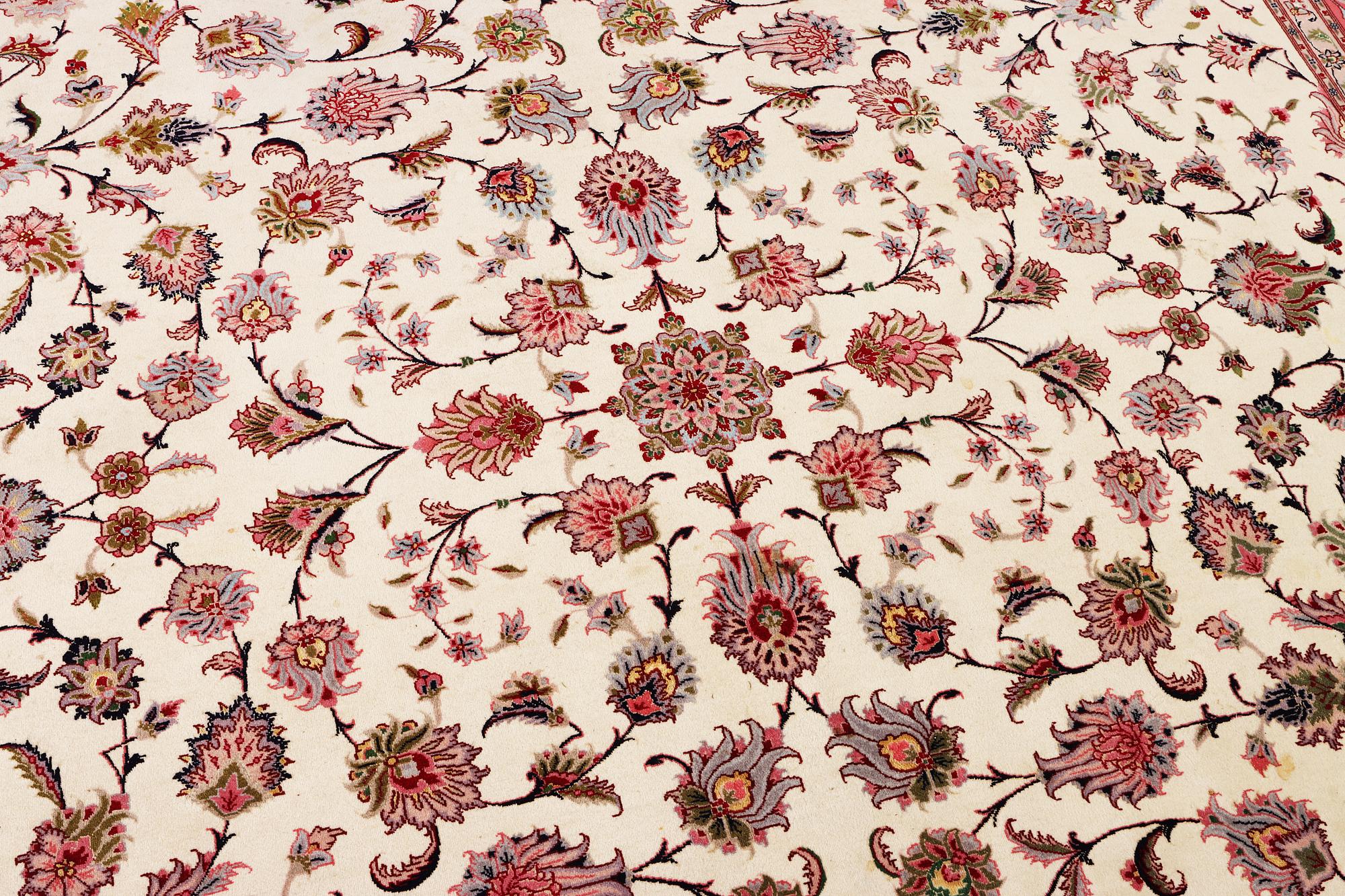 An old Tabriz carpet, part silk, 60 raj, c. 253 x 250 cm.