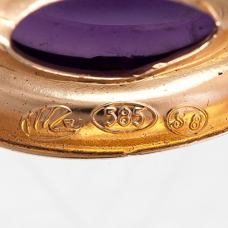 A14K gold pendant, with amethyst and a yellow sapphire. Finnish hallmarks 1995.