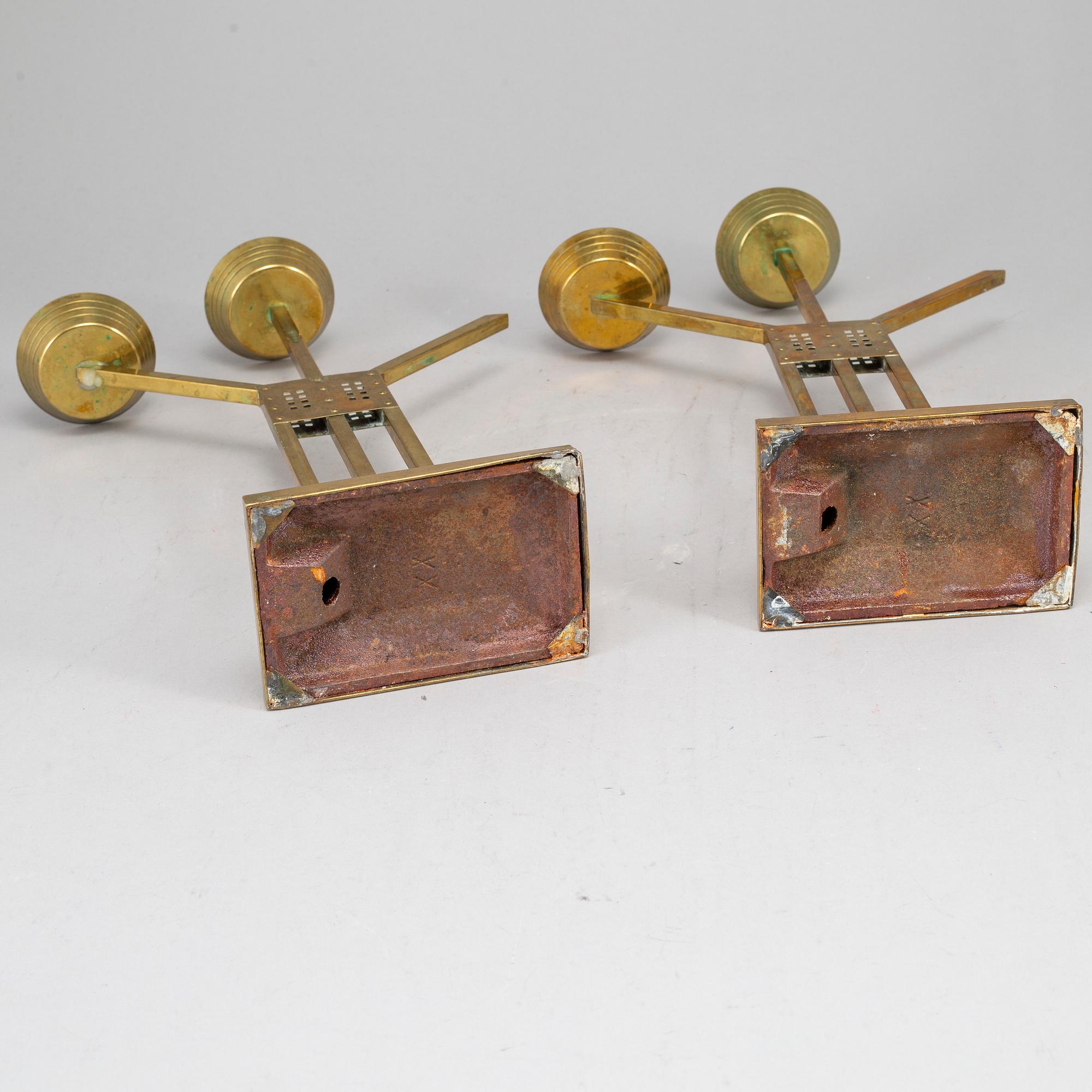 A pair of Art nouveau brass candelabra, early 20th Century.