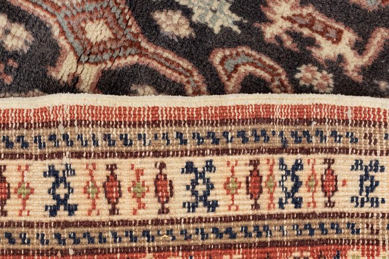 A carpet, semi antique/old, possibly Ardabil, c. 180 x 115 cm.