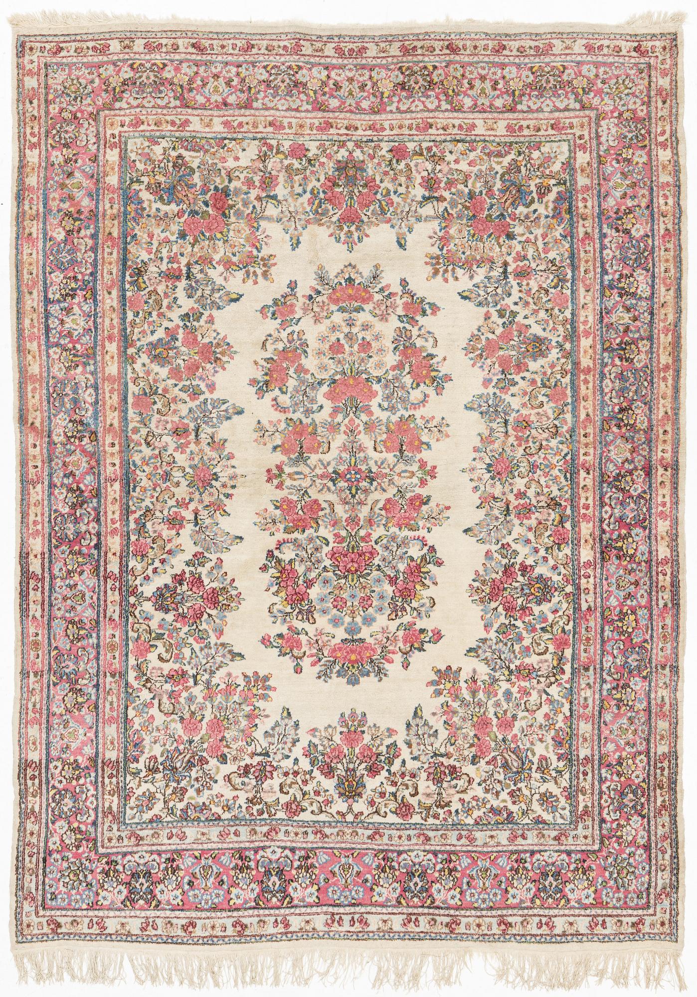 A Kirman carpet, old, c. 290 x 212 cm.