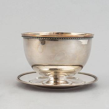 A silver sauce bowl, made by GAB in Sweden 1959.