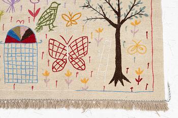 A hand-embroidered Kelim rug, 186 x 123 cm.