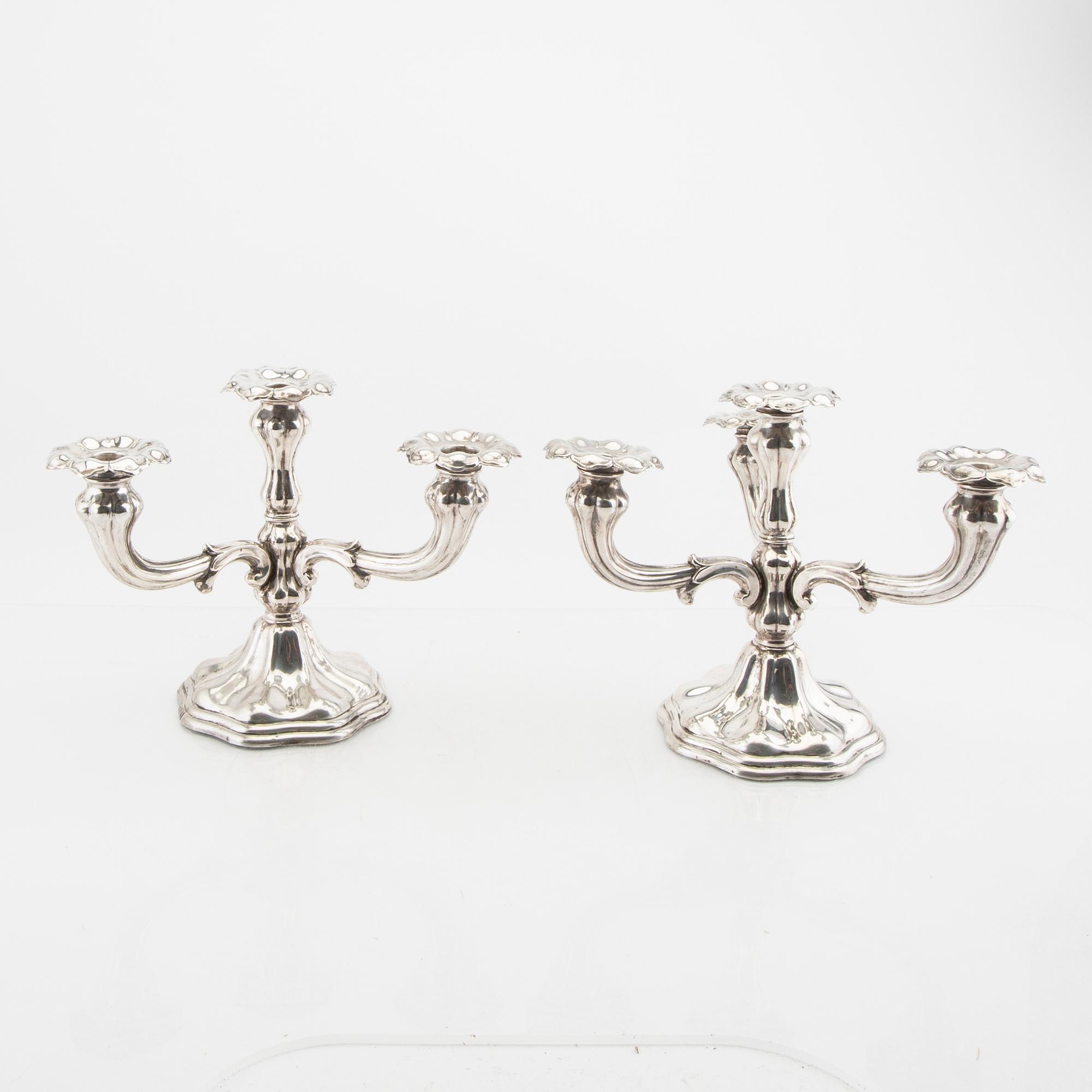 A Swdish 20th century pair of silver candelabra maark of CG Hallberg Stocholm 1946.
