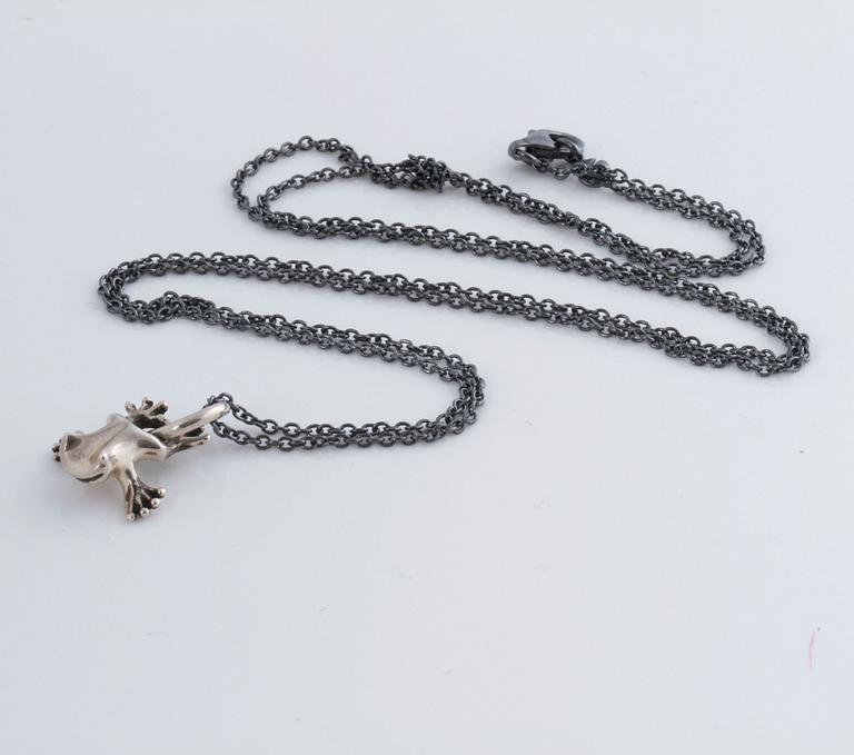 A pendant, "My friend" by Ole Lynggaard.
