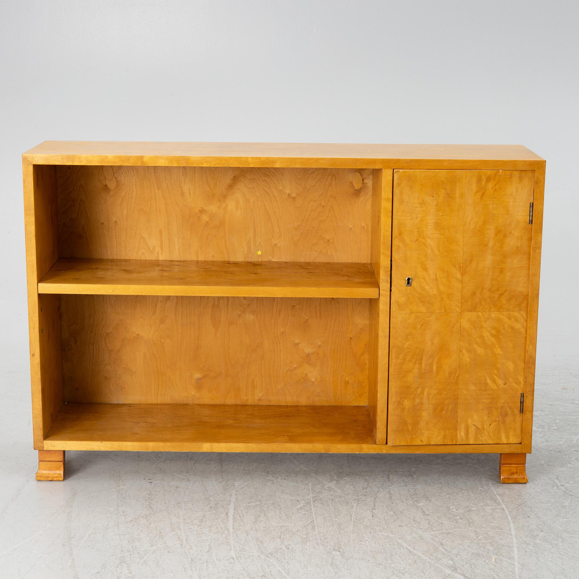 A bookcase with cabinet, 1930's.
