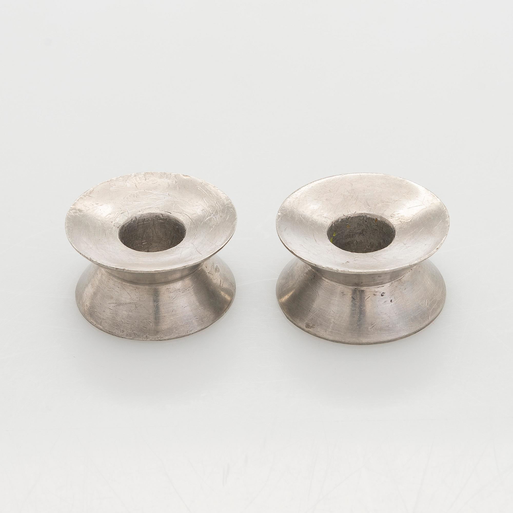 Viljo Hirvonen, a pair of rare mid-20th-century candlesticks manufactured by Valaistustyö for Artek.