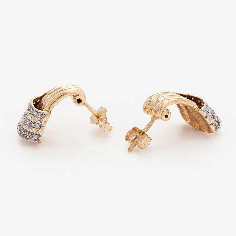 Korvakorut, 14K kultaa ja timantteja.