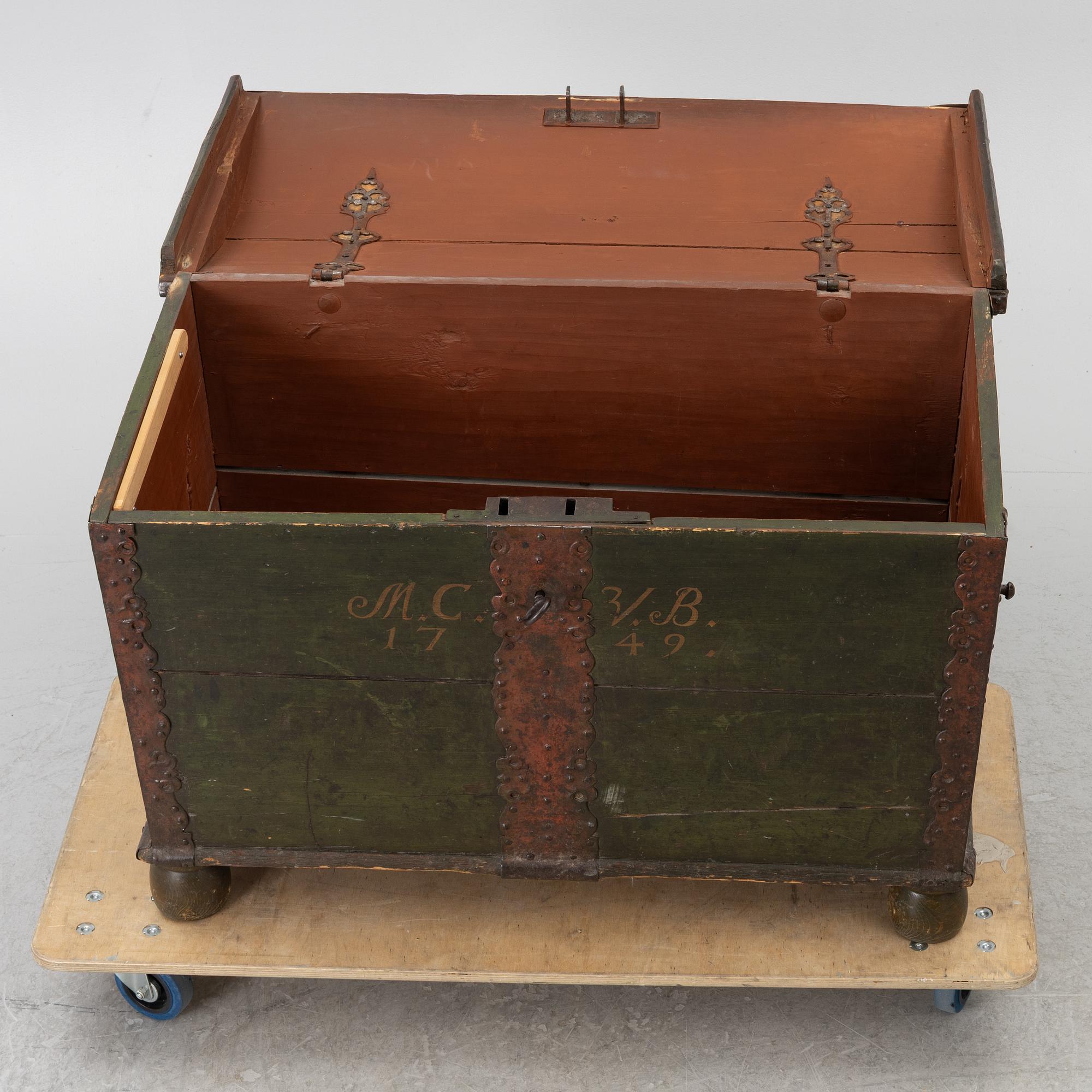 A folk art chest, dated 1749.