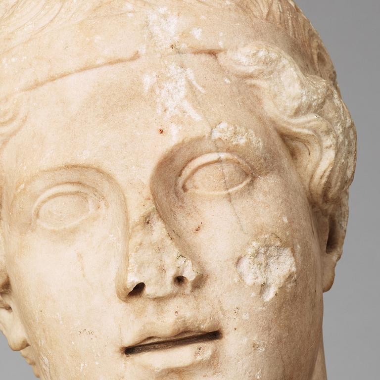 A marble portrait head of an athlet, Roman 150 AD or later ie until modern times.