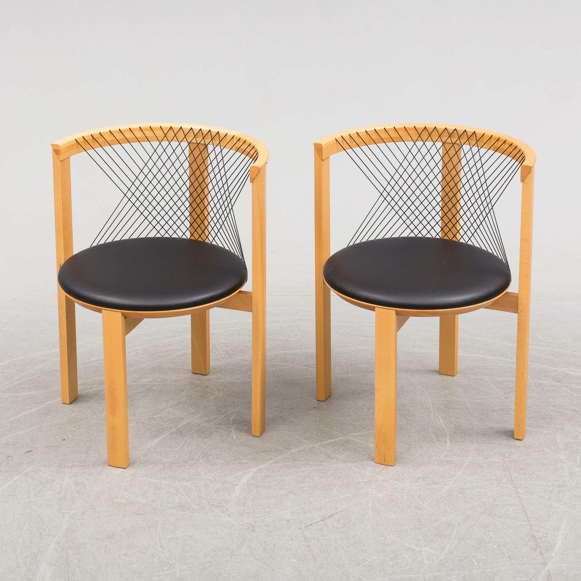 a pair of 'String Chairs' by Niels Jörgen Haugensen, Tranekaer Furniture, Denmark, late 20th century.