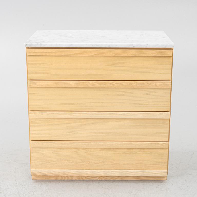 A contemporary chest of drawers.