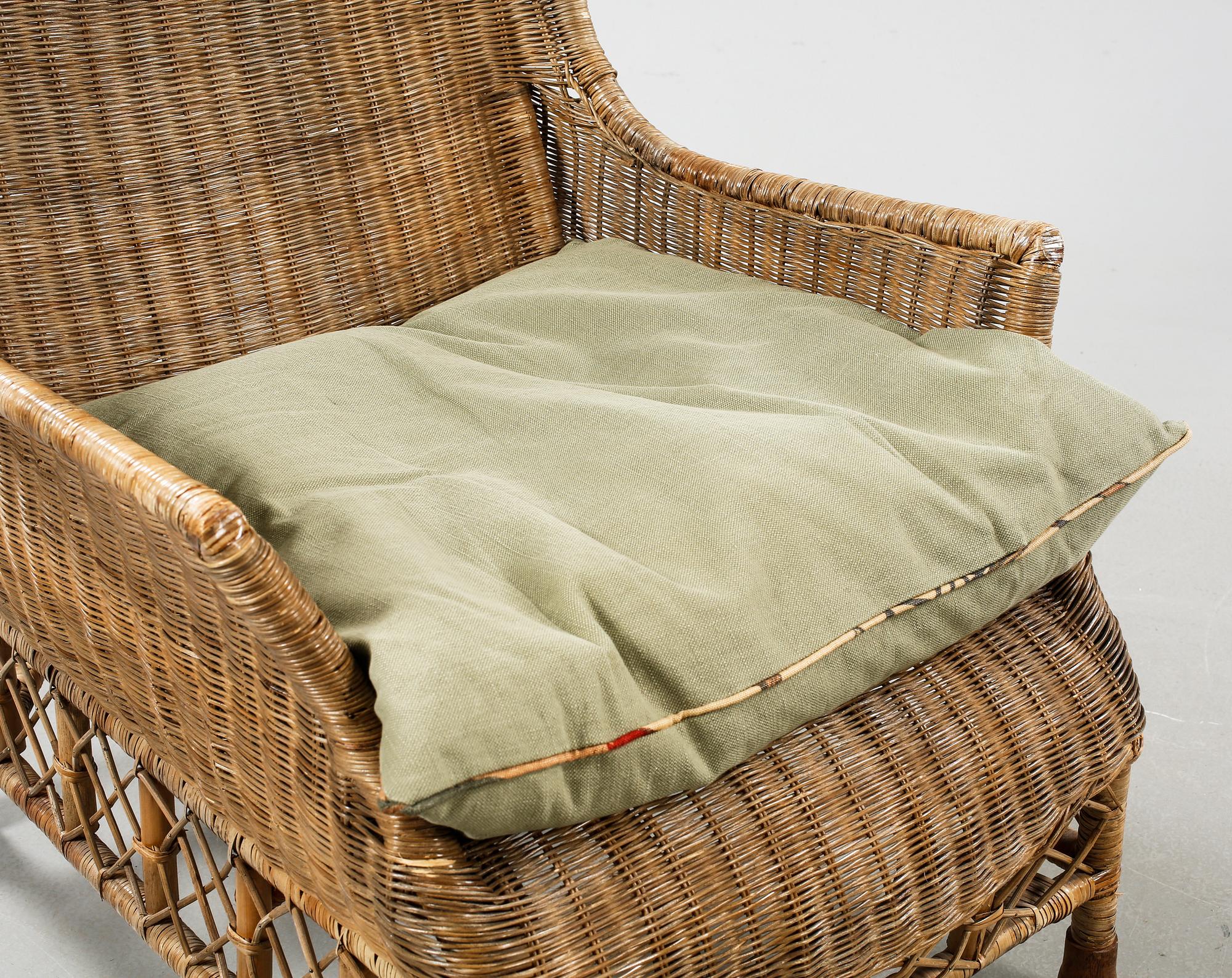 A rattan arm chair from the second half of the 20th century.