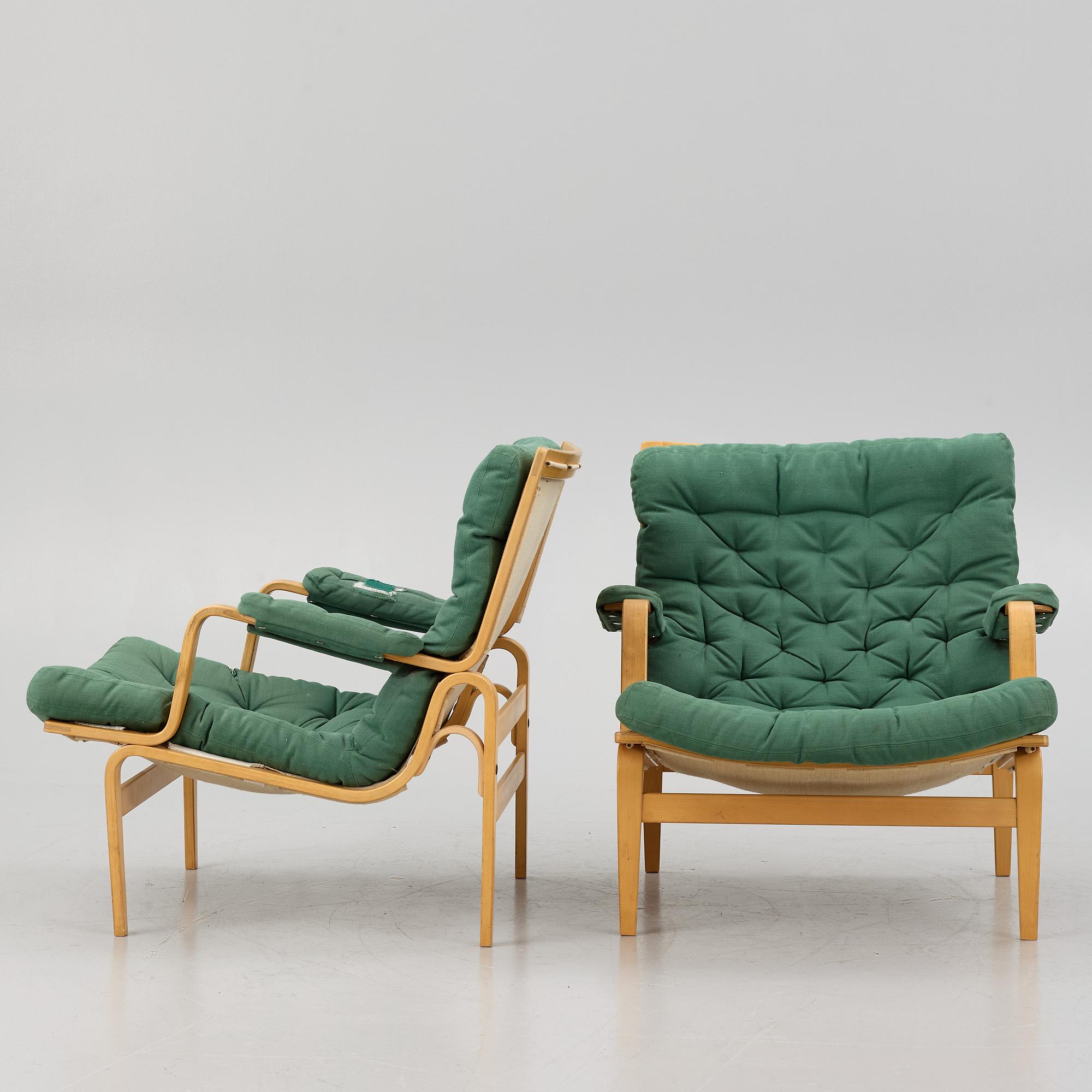 Bruno Mathsson, a pair of "Ingrid" armchairs, Dux, Sweden, second half of the 20th century.