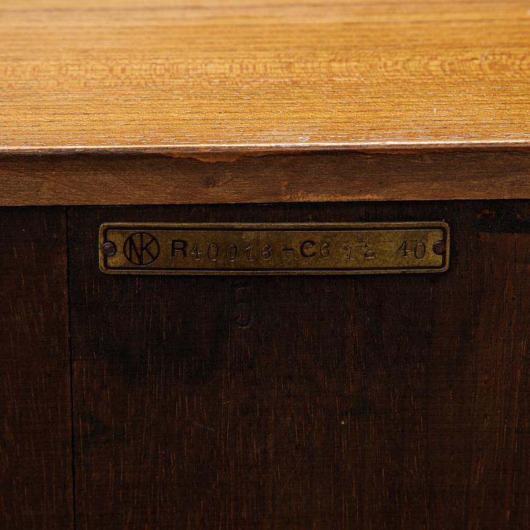 A bookshelf by Axel Einar Hjorth for Nordiska Kompaniets verkstäder (NK), Nyköping, late 1930's.