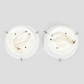 Arne Jacobsen, a pair of ceiling lamps/wall lamps, "AJ-Eklipta", Louis Poulsen, Denmark.