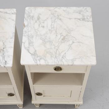 A pair of Gustavian style bedside tables, early 20th century.