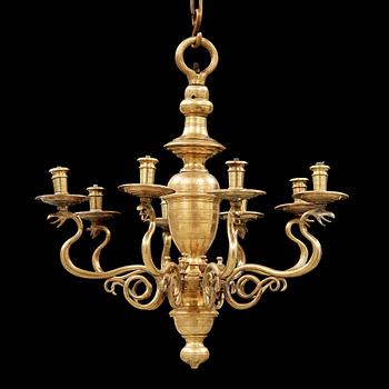 A 19th century eight-light brass chandelier in the manner of Hans Rogiers van Harelbeke.